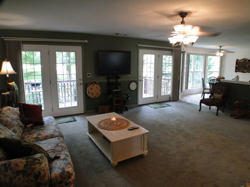 The large living room has two sets of french doors opening to the deck, Macon County Homes for Sale